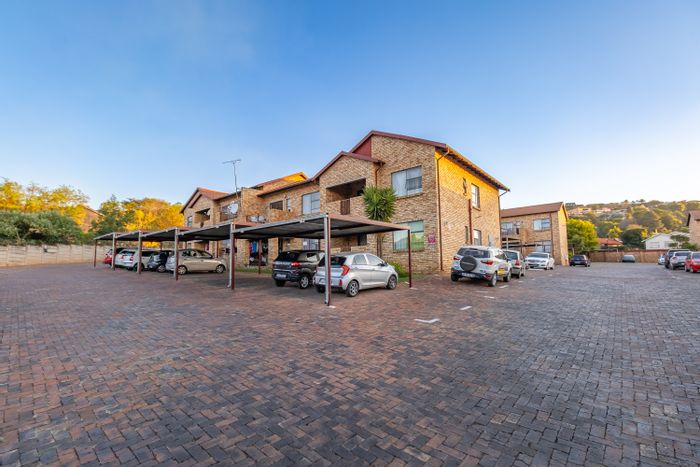 For Sale: 3-Bedroom Apartment in Roodekrans with Private Balcony and Covered Parking.
