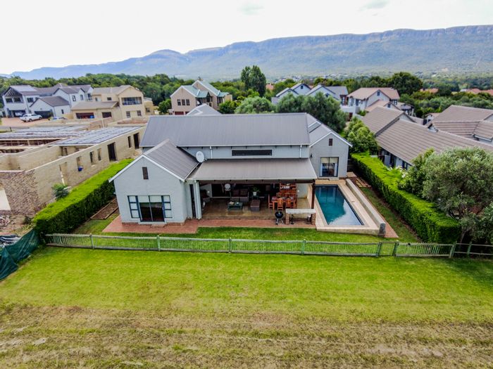 House For Sale in The Coves: 4 beds, heated pool, private jetty access.