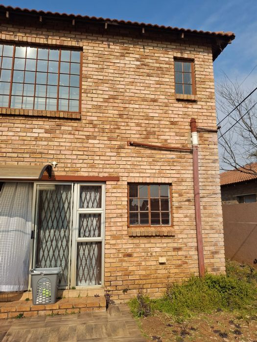 Eike Park Apartment For Sale: 2 Bedrooms, walk-through garage, private yard, ample parking.