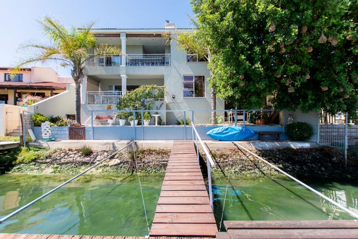 House for Sale in Velddrif Central: Waterfront living with private jetty and study.