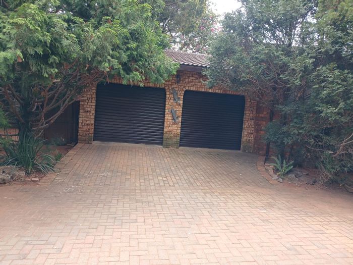 For Sale: Spacious Greenhills house with 4 beds, flatlets, and garden braai area.
