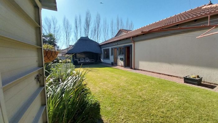 For Sale: House in Trichardt with 3 bedrooms, study, garden, and security features.