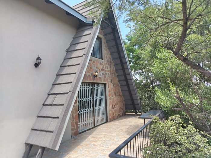 For Sale: House in Utopia Nature Estate with communal pools, tennis courts, and solar power.