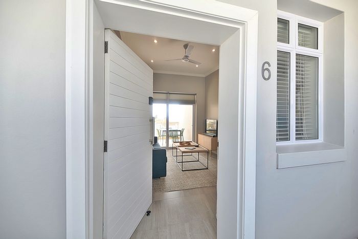 For Sale: 2-Bedroom Apartment in Struisbaai Central with Balcony and Rental Potential.