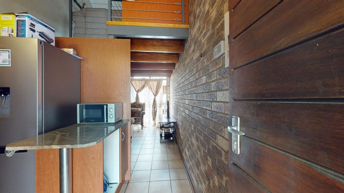 1-Bedroom Apartment For Sale in Dassie Rand, includes parking and vibrant location.