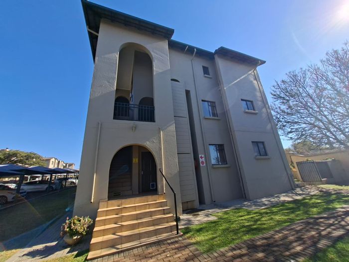 For Sale: Apartment in Homes Haven with balcony, pool, and double carport.