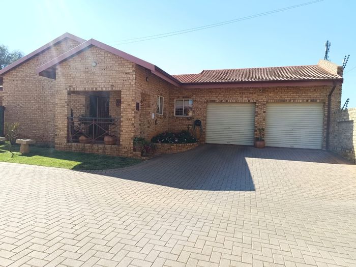 For Sale: Greenhills Townhouse with pool, double garages, and top security features.