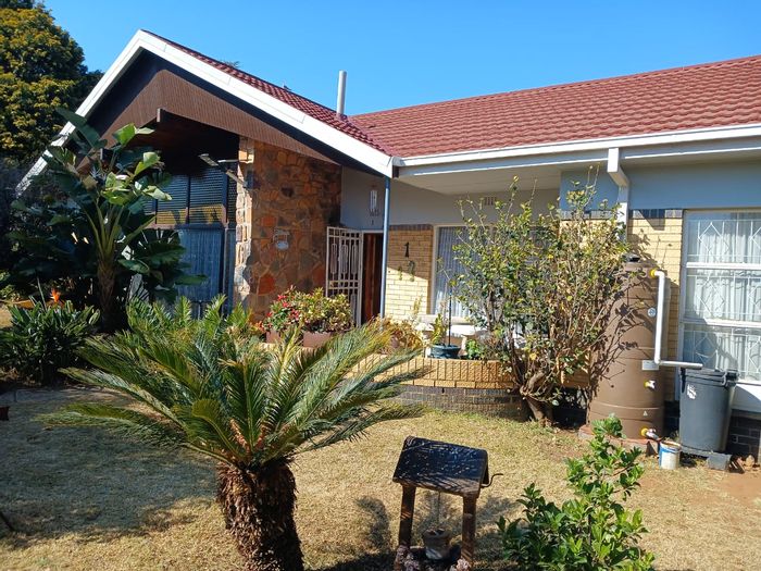 For Sale: Spacious Greenhills house with 3 beds, double garage, and large garden.
