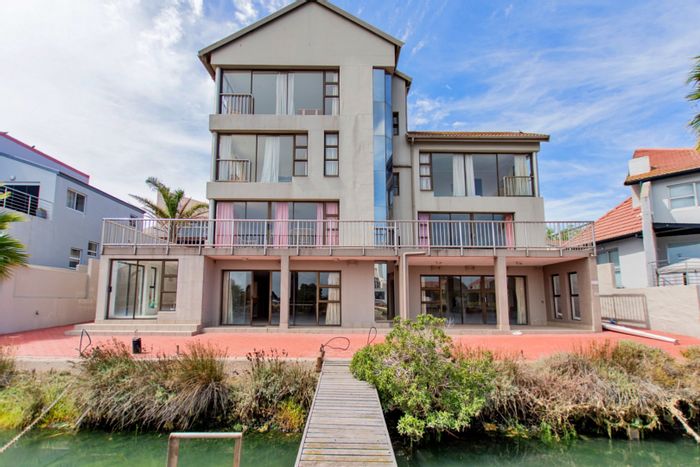 Versatile 11-bedroom house in Port Owen with river views and private jetty. For Sale.
