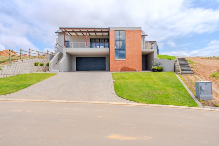 For Sale: House in Hartland Lifestyle Estate with ocean views, secure community, and amenities.