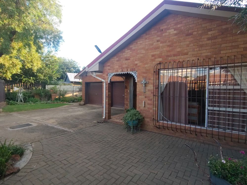 Front yard with garage