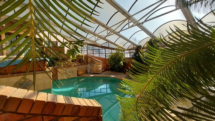 Trichardt House For Sale: Off-grid living, indoor pool, gym, and spacious entertainment areas.