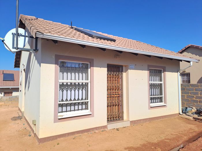 For Sale: House in Witpoortjie with 2 beds, security, and solar geyser.