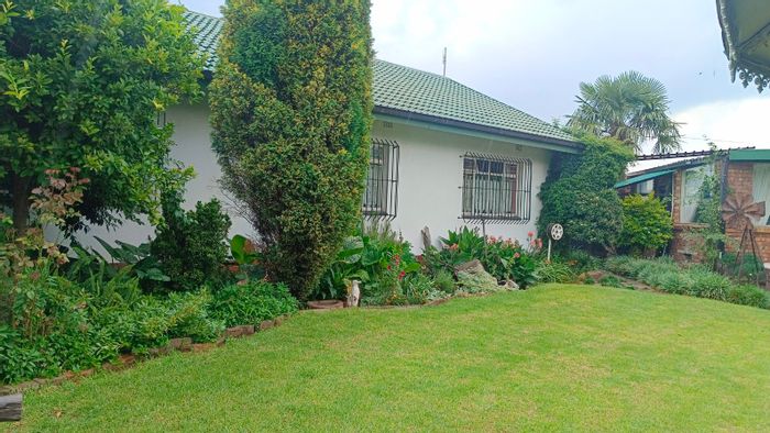 For Sale: House in Kriel Central with 4 bedrooms, braai area, and garden cottages.