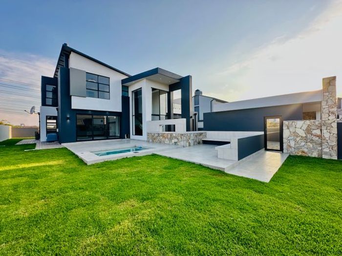 For Sale: House in Midstream Heights with pool, entertainment room, and staff quarters.