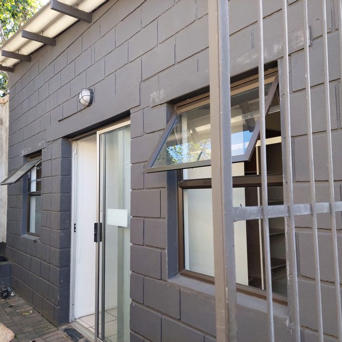 To Rent: 2-Bed Flat in West Bank with secure parking and private yard.