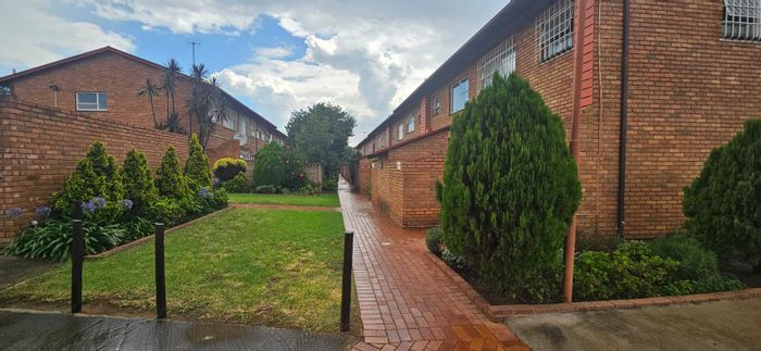 3-Bedroom Townhouse in Bedfordview Central, For Sale with Garden and 24-Hour Security.