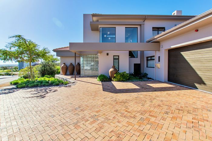 For Sale: House in Langebaan Country Estate with golf course, pool, and advanced tech.