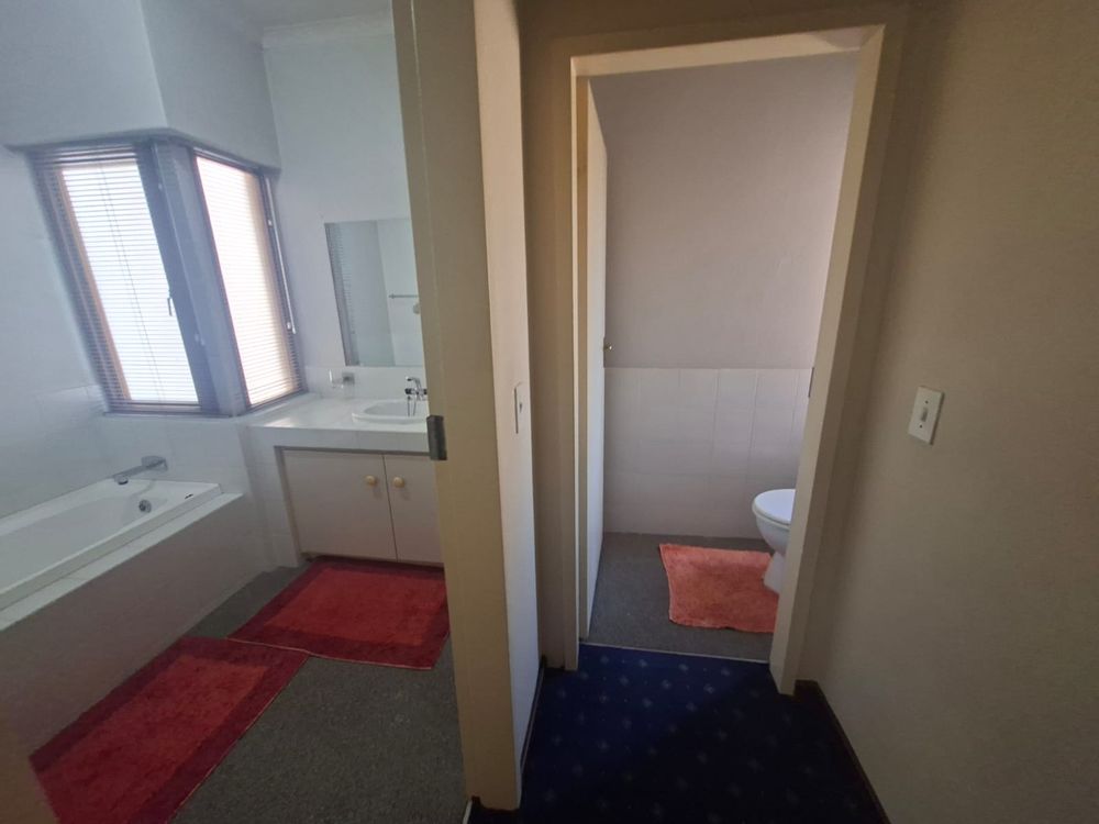 First bathroom with separate toilet