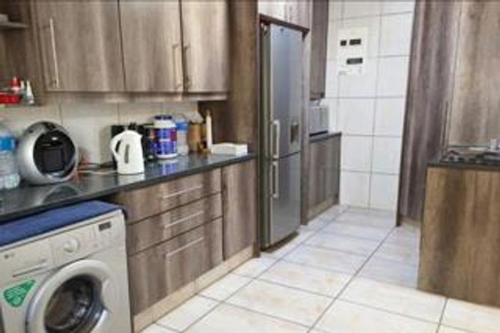 For Sale: 4-bed house in Buurendal with cottage, garden, and security features.