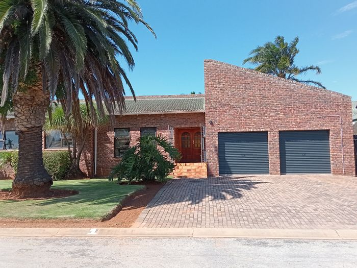 For Sale: House in Campher Park with pool, braai area, and secure garden.