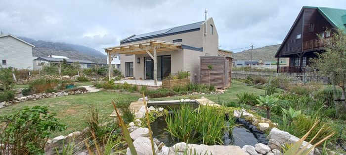 House for Sale in Pringle Bay Central: 3 beds, office, off-grid, mountain views.