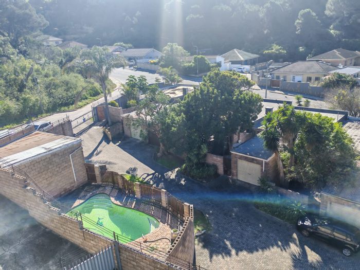 South End Townhouse For Sale: 2 beds, communal pool, pet-friendly, garage.