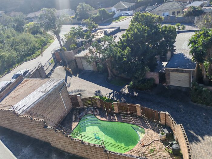 South End Townhouse For Sale: 2 beds, communal pool, pet-friendly, garage.