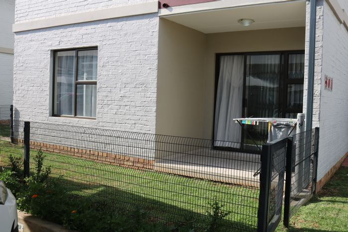 For Sale: Townhouse in Nortons Home Estate with security, pool, and private patio.