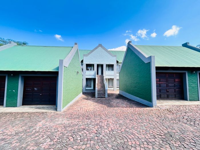 For Sale: 3-Bedroom Townhouse in Louis Trichardt Central with garage and parking.
