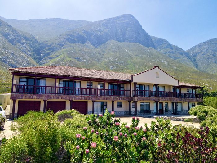 For Sale: House in Bettys Bay Central with flatlets, pool, and panoramic views.