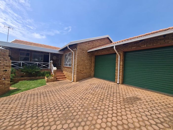 For Sale: Noordheuwel Townhouse with 3 Bedrooms, Garage, Garden, and Braai Area.