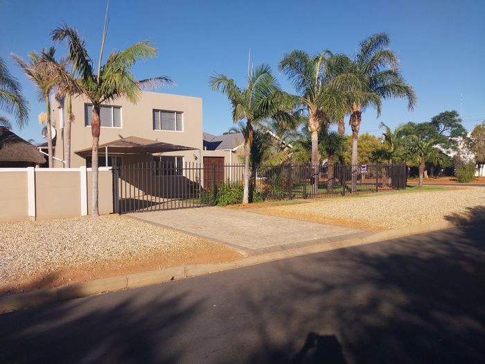 For Sale: House in Van Riebeeck Park with pool, office, and spacious living areas.