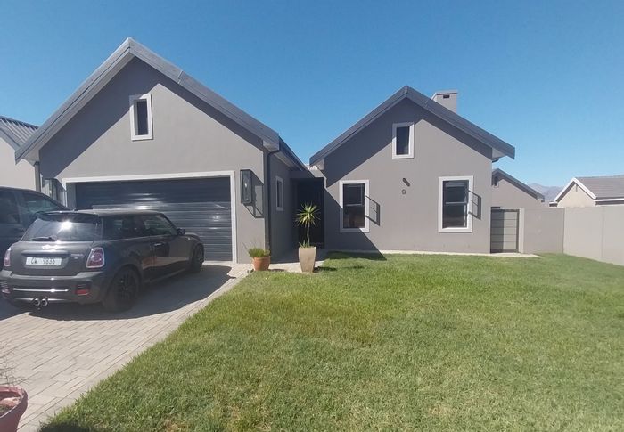 For Sale: Smart home in Altona Village, 3 beds, 2 baths, mountain views.