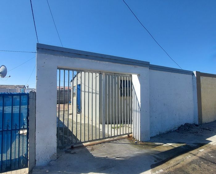 2-Bedroom House For Sale in Park Village with secure parking and outdoor space.