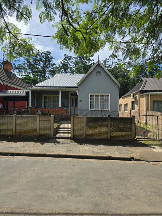 Unique dual-home setup in Prestbury, For Sale, ideal for residence and business.