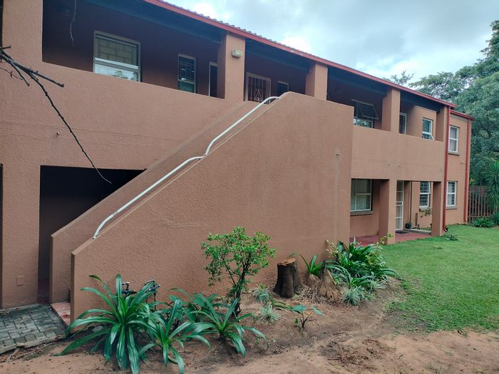 2-Bedroom Apartment For Sale in Safari Gardens with balcony and covered parking.