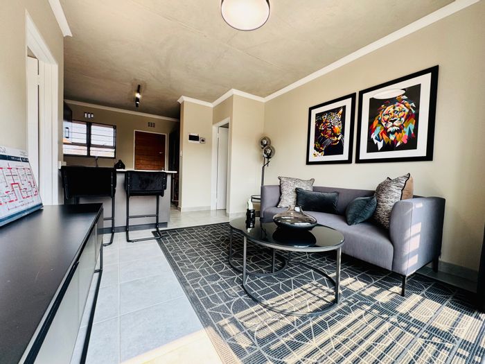 For Sale: 2-bedroom apartment in Sinoville with private garden and parking.