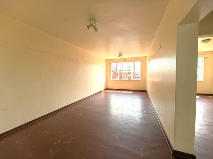 For Sale: Primrose Apartment with 2 Bedrooms, Open Plan Living, and Covered Parking.