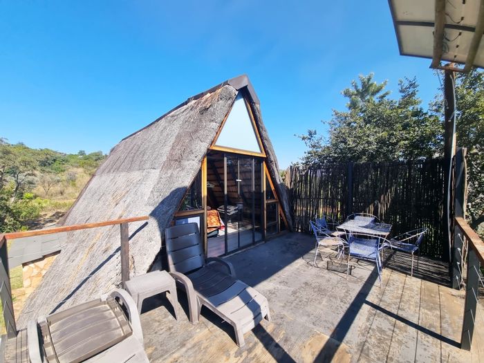 For Sale: House in Utopia Nature Estate with communal pools, tennis court, and hiking trails.