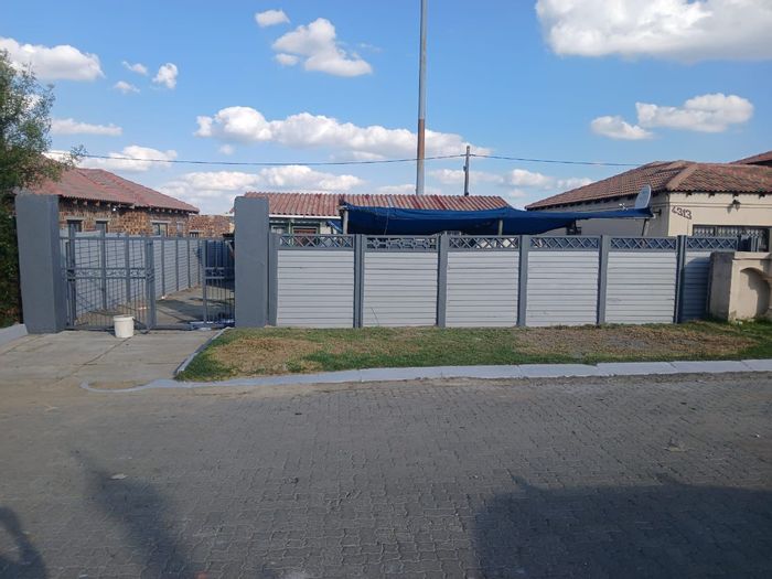 House For Sale in Embalenhle Ext 5: 3 Bedrooms, open-plan layout, renovation opportunity.