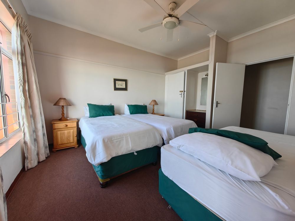 Spare room with 3 single beds