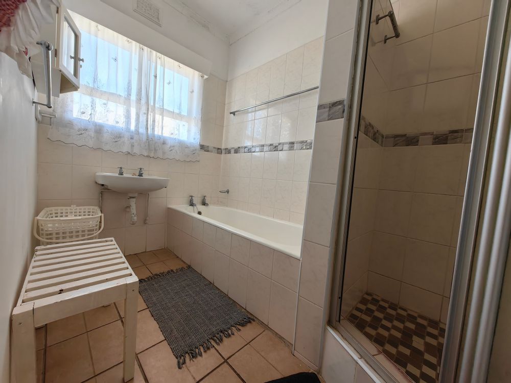 Full bathroom, separate toilet next door