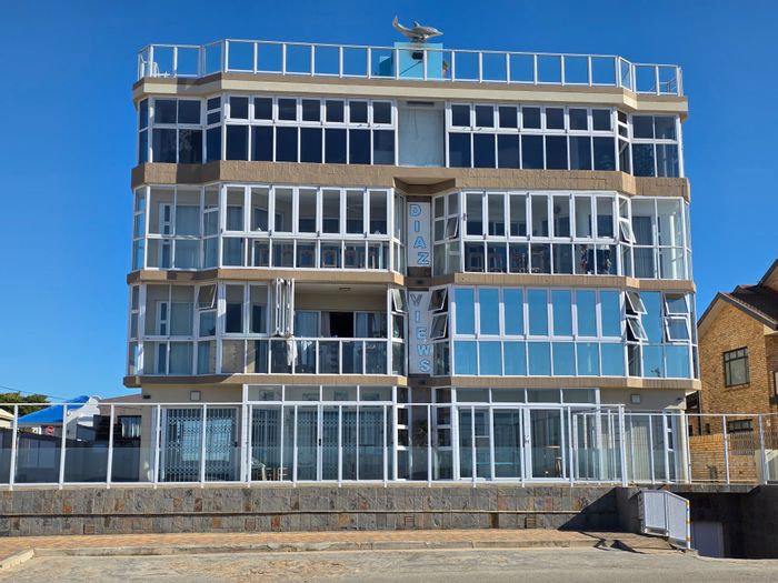 Beachfront Apartment For Sale in Jeffreys Bay Central with Secure Parking and Amenities.