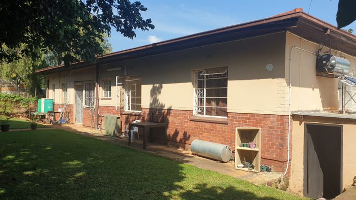 Barberton Central House For Sale: 4 bedrooms, 2 baths, ample parking, family-friendly layout.