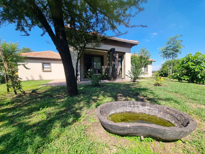 Ngwenya River Estate House For Sale: 3 beds, river access, lush garden, security.