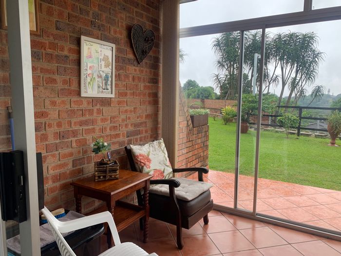 For Sale: Townhouse in Hatton Estate with garden views, pool, and garage.