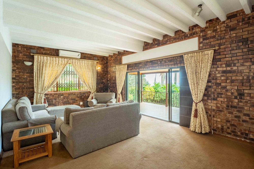 Lounge with large sliding doors onto patio