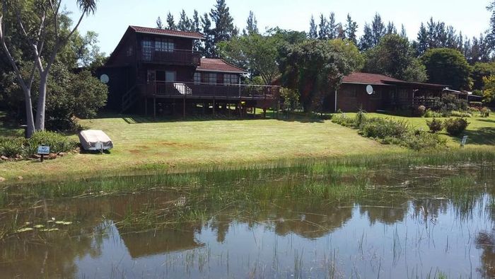 For Sale: House in Albert Falls with lake views, solar system, and spacious storeroom.