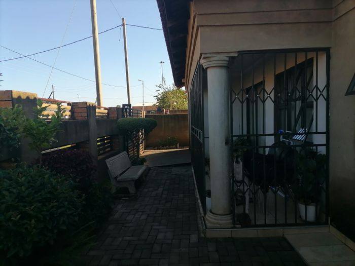 2-Bedroom House For Sale in Orange Farm with garden, secure parking, and community access.